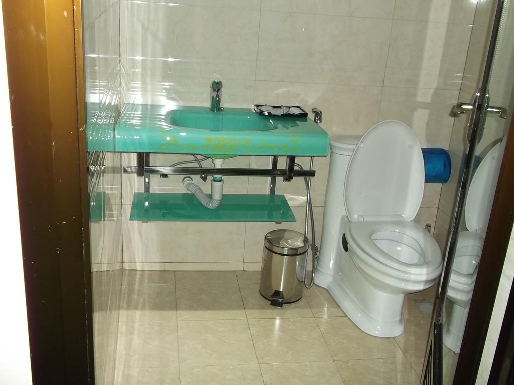Star City Hotel Dar es Salaam Quarto foto