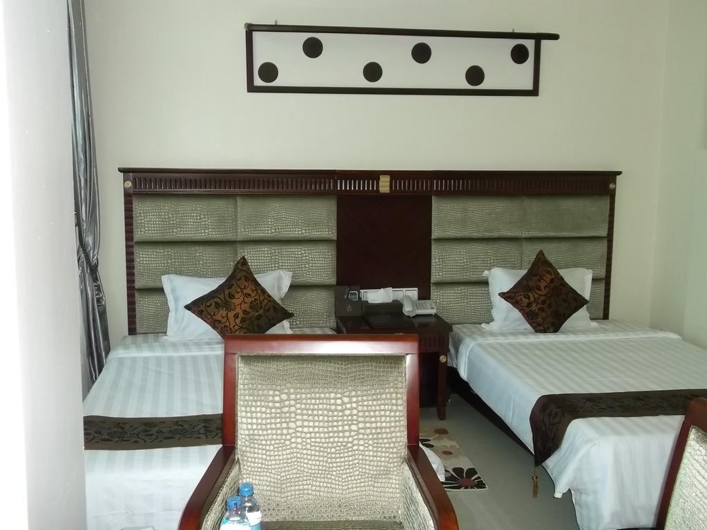 Star City Hotel Dar es Salaam Quarto foto